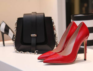 Red shoes black leather purse